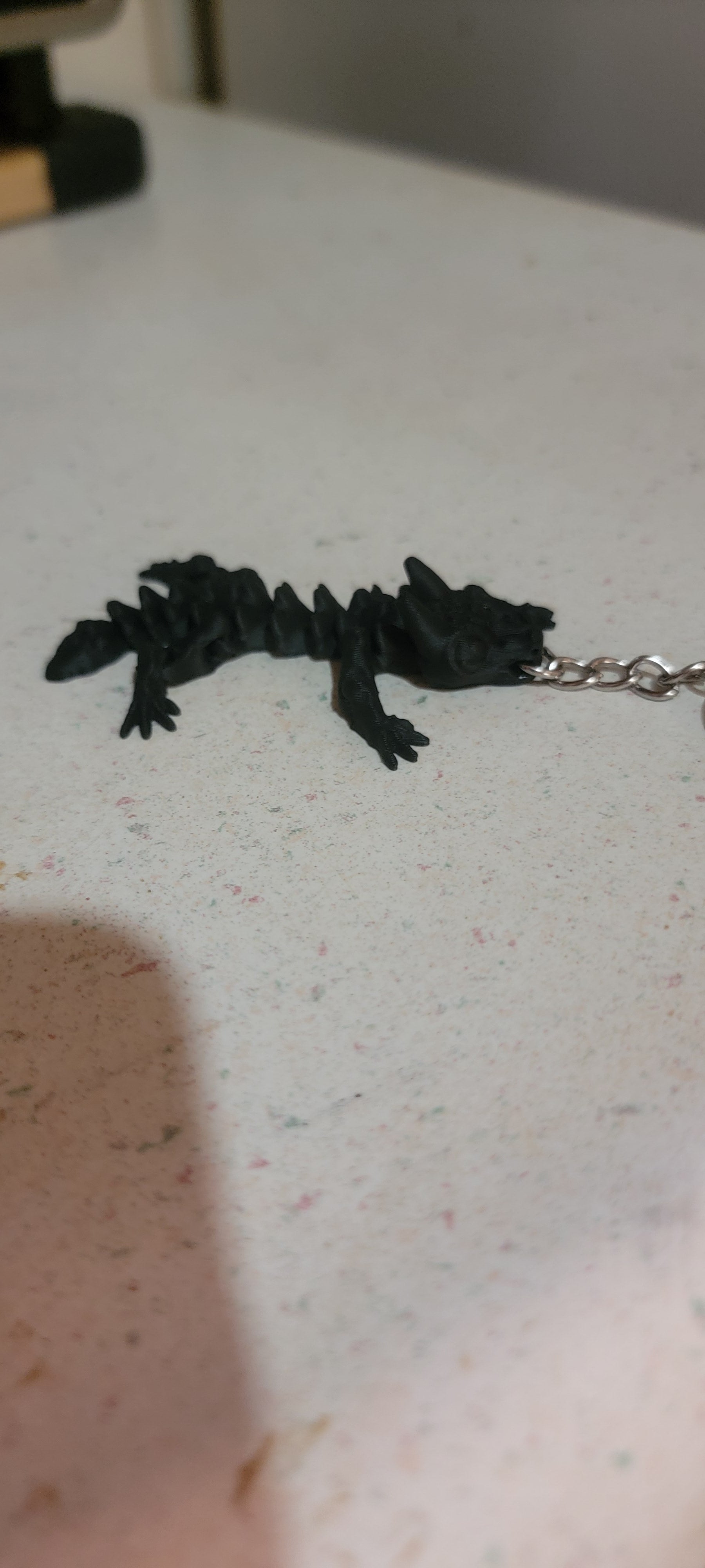 articulated mini dragon key chain