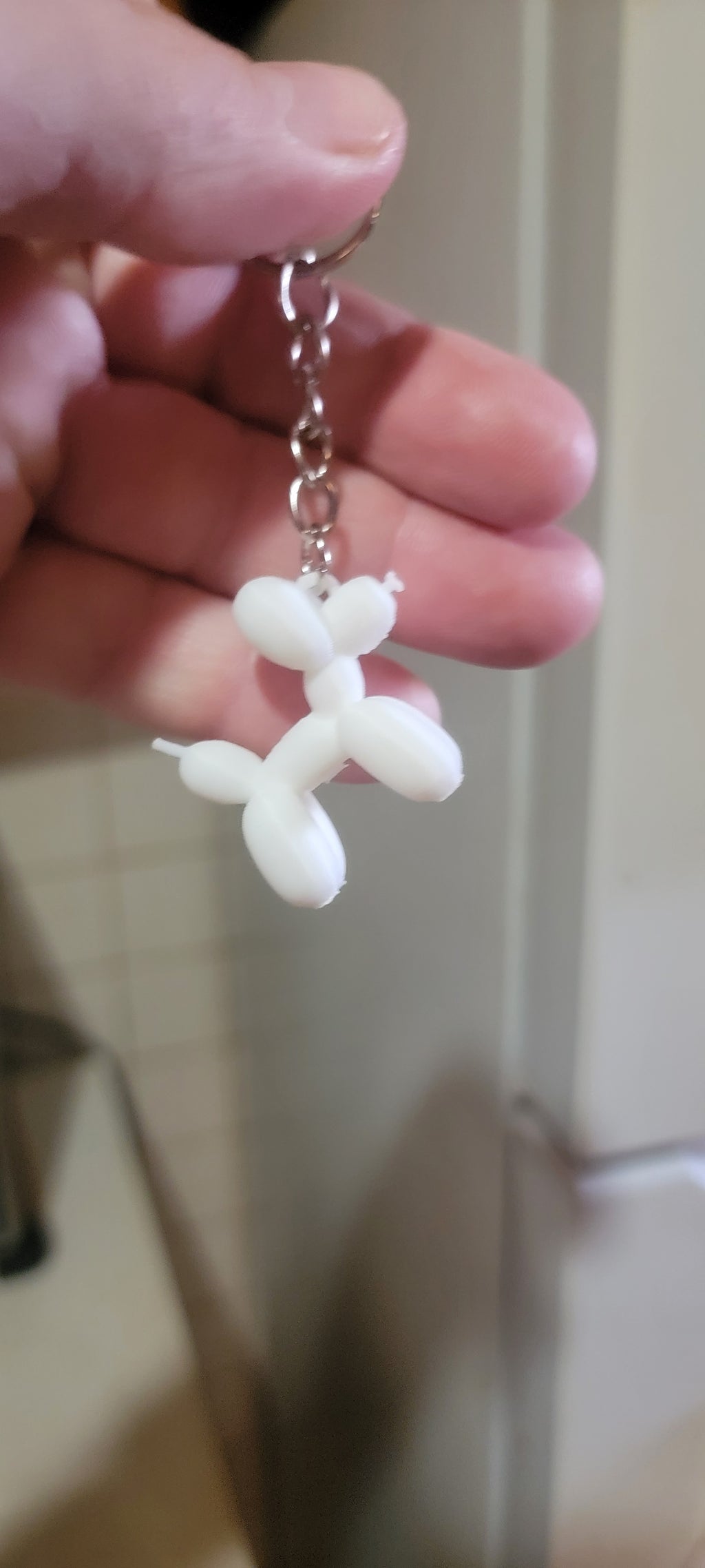 Balloon animal dog keychain