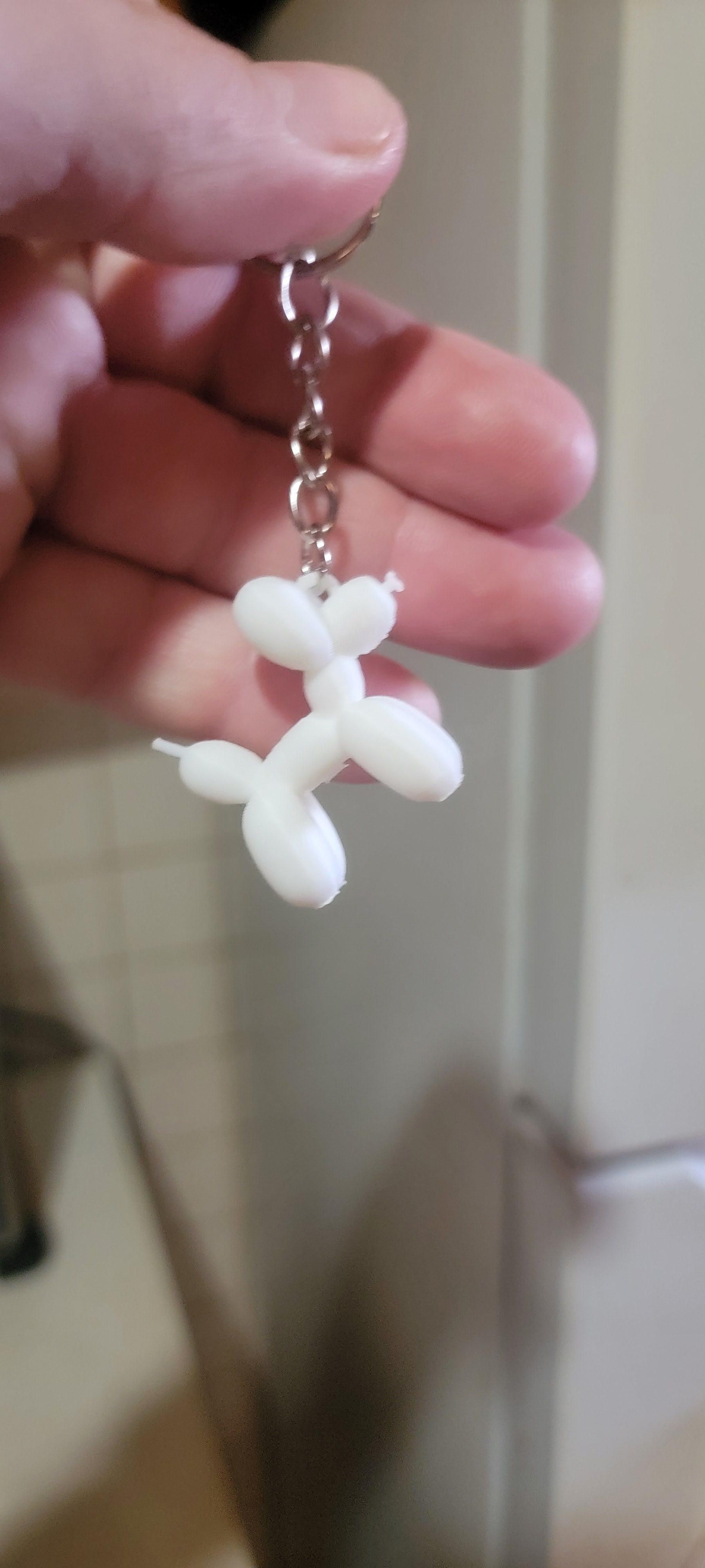 Balloon animal dog keychain